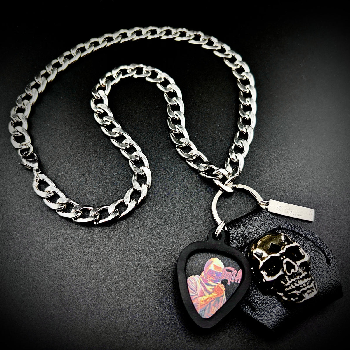 Death Leprosy Guitar Pick Pendant Necklace by SKULL & CHAIN. For fans of Chuck Schuldiner.