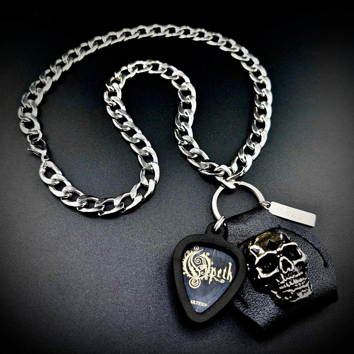 Opeth Mikael åKerfeldt Guitar Pick Pendant Necklace by SKULL & CHAIN. For fans of Mikael Åkerfeldt.