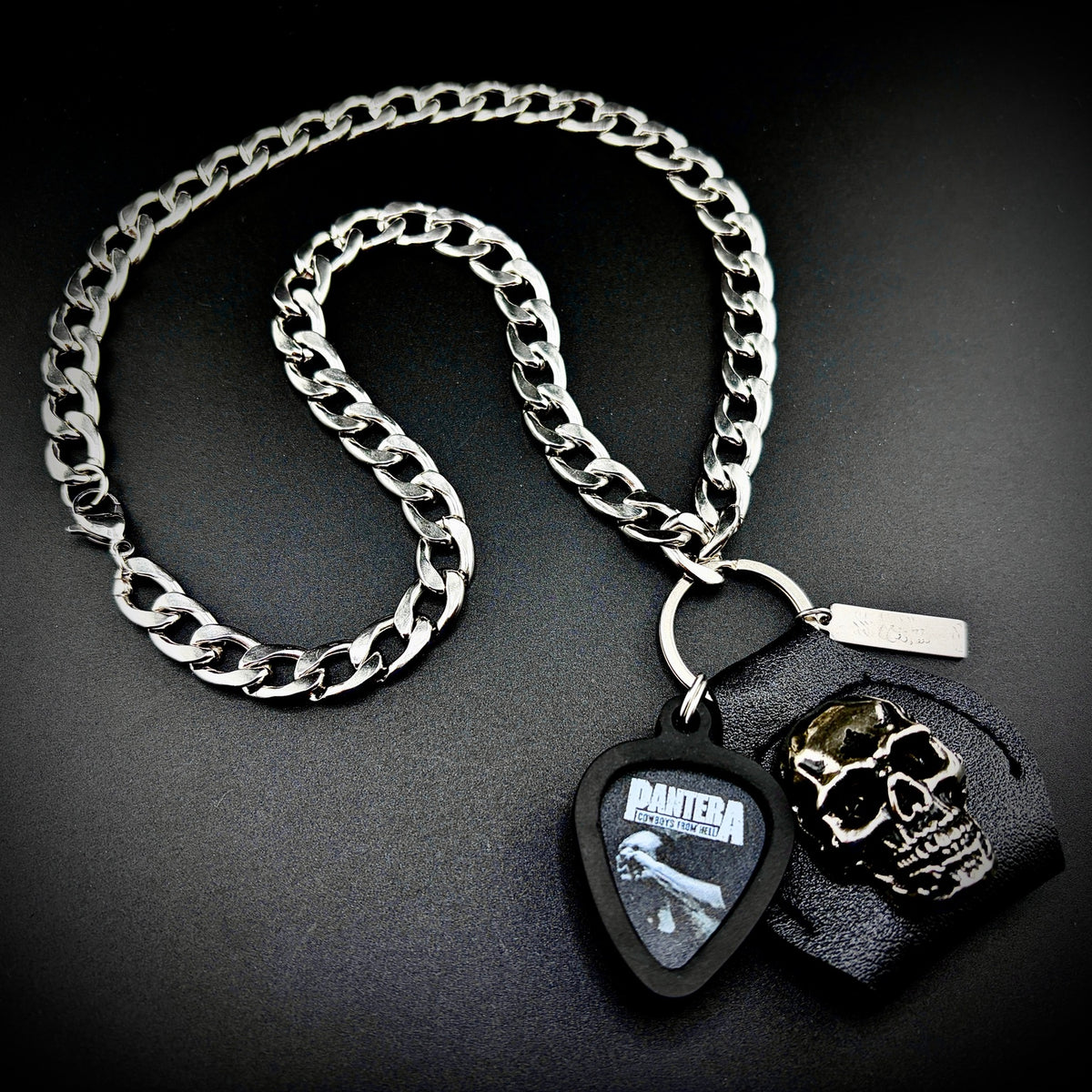 PANTERA VULGAR DISPLAY OF POWER guitar pick pendant necklace with silver curb chain and skull holder by SKULL & CHAIN. For fans of Dimebag Darrell.