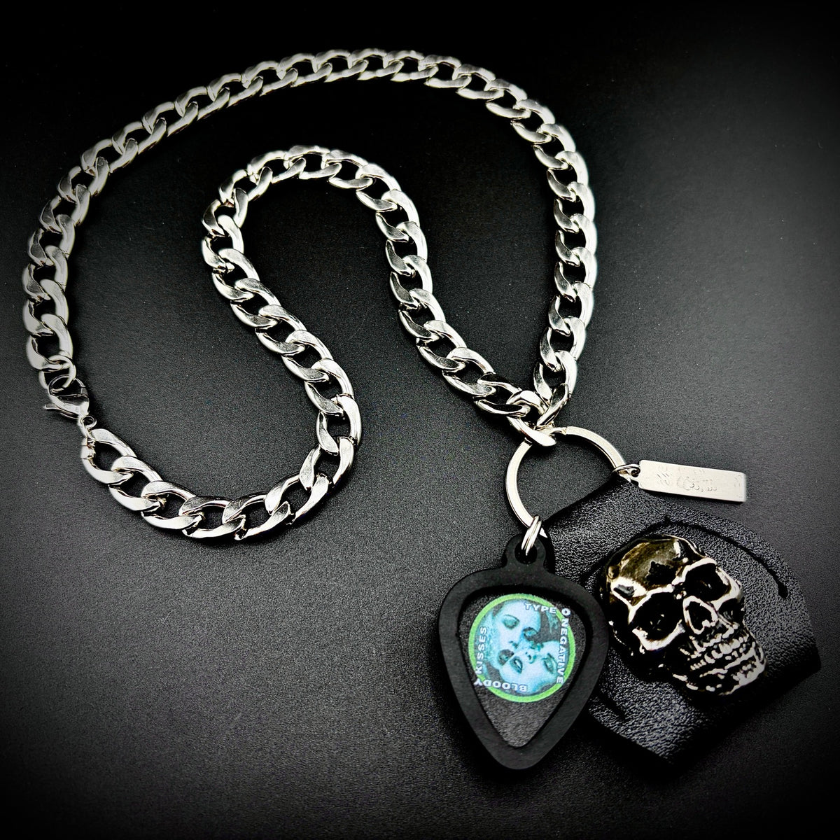 TYPE O NEGATIVE BLOODY KISSES guitar pick pendant necklace with silver curb chain and skull holder by SKULL & CHAIN. For fans of Peter Steele.