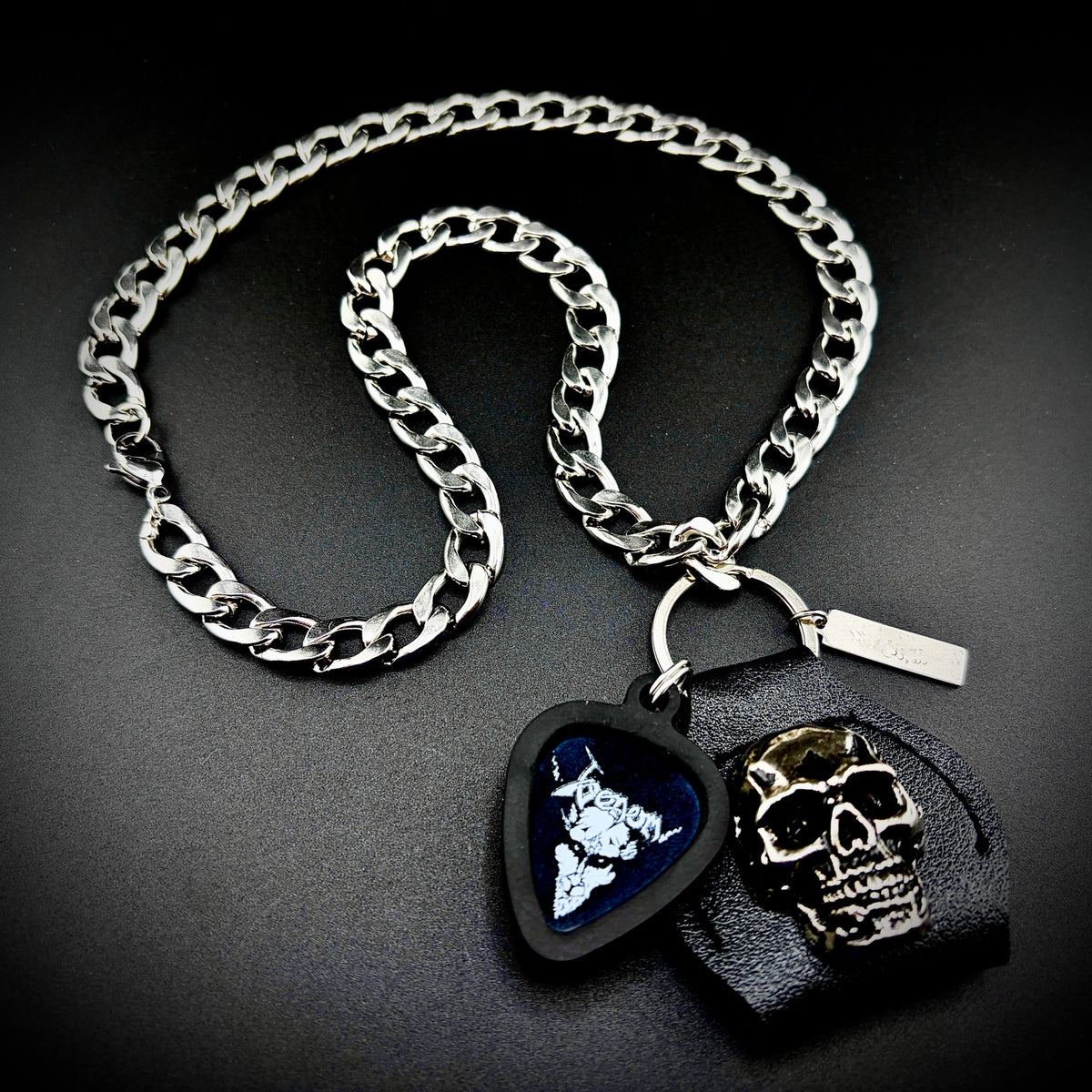 Venom Black Metal Guitar Pick Pendant Necklace by SKULL & CHAIN. For fans of Cronos and Mantas.